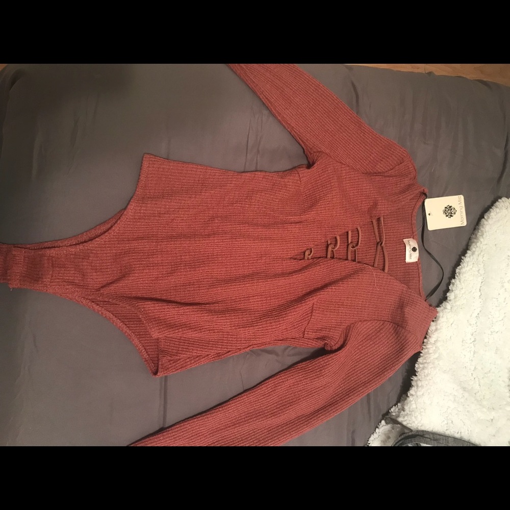 Orange-red long sleeve body suit